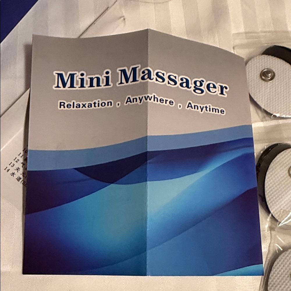 Handheld Electronic Massager with Multiple Electrode Pads - White/Black - Picture 9 of 13
